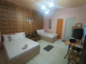 DJCI Apartelle Walk to Robinson & NE Pacific Mall 3 Min to SM Cabanatuan
